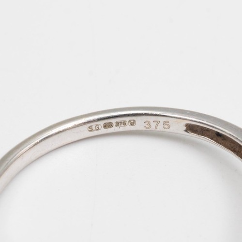 123 - 9ct gold designer diamond ring, the centre stone approximately 0.2ct surrounded by 12 brilliant cut ... 