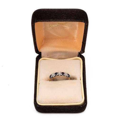 125 - 18ct hallmarked gold sapphire and diamond ring, set with four sapphires and three diamonds, size M, ... 