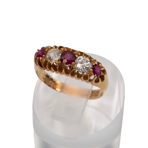 127 - An 18ct gold, ruby and diamond ring set ring, the old cut diamonds measuring approximately 0.50 cara... 