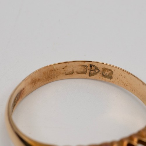 127 - An 18ct gold, ruby and diamond ring set ring, the old cut diamonds measuring approximately 0.50 cara... 