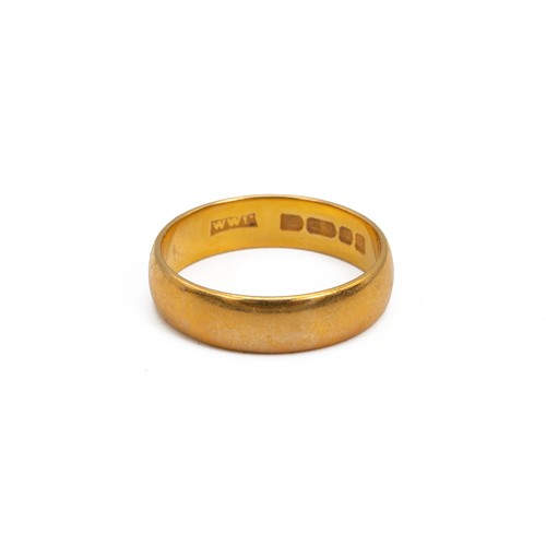 129 - A 22ct gold hallmarked wedding band, size Q, weight 5.5 grams.