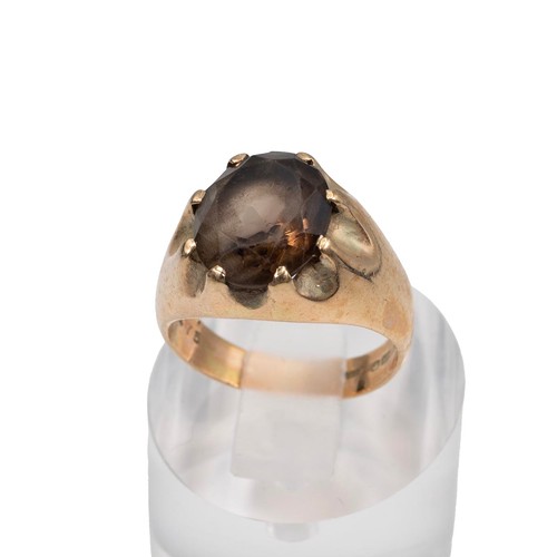 130 - A 9ct hallmarked gold smokey quartz signet ring, mounted in an eight claw setting, approx 3.0ct, siz... 