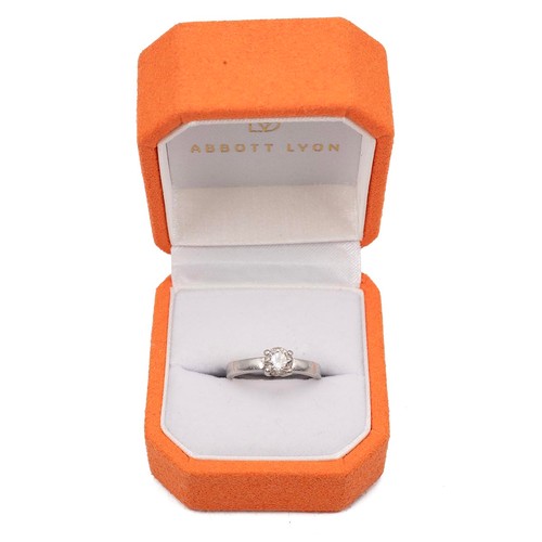 132 - A 950 platinum set solitaire diamond ring, approx 0.5ct, mounted in a four claw raised setting, size... 