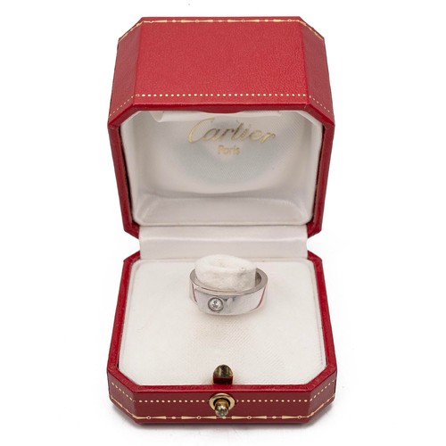133 - Cartier, an 18ct white gold and diamond ring, the brilliant cut diamond measuring approx. 0.07ct, en... 