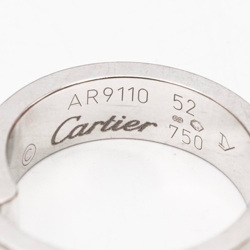 133 - Cartier, an 18ct white gold and diamond ring, the brilliant cut diamond measuring approx. 0.07ct, en... 