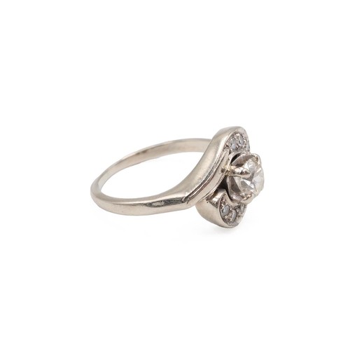 135 - A 14ct gold and diamond twist ring, the central brilliant cut diamond measuring approximately 0.50 c... 