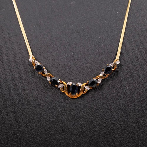 139 - 9ct gold sapphire and diamond pendant necklace, the pendant set with five sapphires and twelve diamo... 