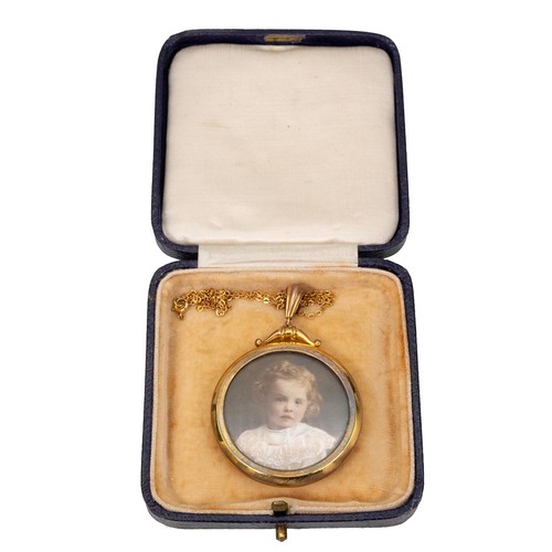 144 - An early 20th-century portrait pendant of a young girl, set in a 9ct gold setting and chain, with a ... 