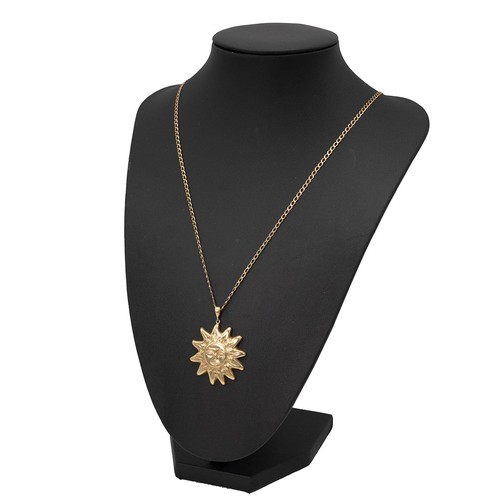 146 - An 18ct gold hallmarked sun face pendant weight 15.3 grams, and a 9ct gold necklace with lobster cla... 