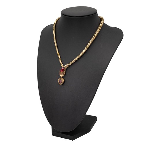 153 - A finely detailed Victorian 15ct gold serpent articulated necklace, set with a garnet cabochon to th... 