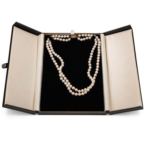 155 - Two strand pearl knotted necklace with 9ct push-pull gold clasp, L43cm, in original fold box.