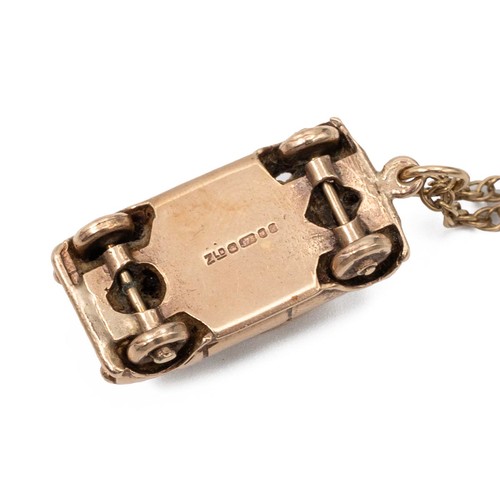 161 - A 9ct gold model of a Mini Cooper, 5.6 grams, on a 14ct gold necklace, 2.8 grams.