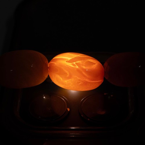 165 - An amber bead necklace of fifty two graduating beads drop 29cm, weight 28.2 grams.