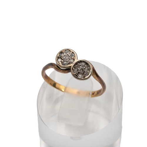 136 - 18ct and platinum set diamond ring the mont with circular twist each set with seven old cut diamonds... 