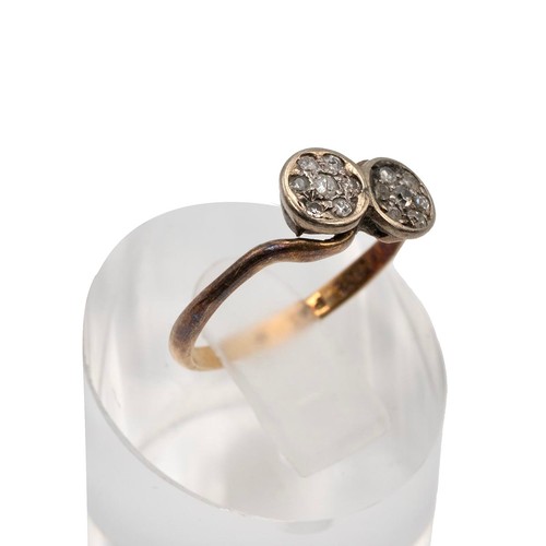 136 - 18ct and platinum set diamond ring the mont with circular twist each set with seven old cut diamonds... 