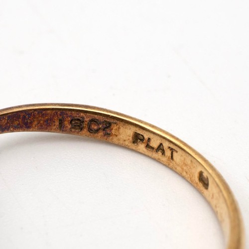 136 - 18ct and platinum set diamond ring the mont with circular twist each set with seven old cut diamonds... 