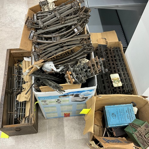 243 - Comprehensive collection of O Gauge track, including vintage transformers.