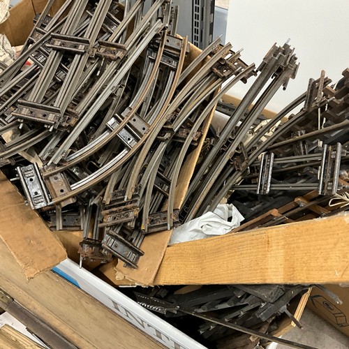 243 - Comprehensive collection of O Gauge track, including vintage transformers.