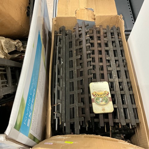 243 - Comprehensive collection of O Gauge track, including vintage transformers.