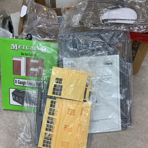 248 - Collection of railway model kits and accessories, including military soldiers, buildings etc.