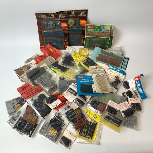 249 - Collection of model railway model kit accessories, 4mm, including ratio and parkside and an assortme... 