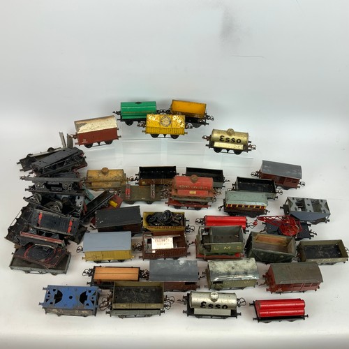 255 - Collection of early 20th century and later O gauge tin plate rolling stoke, many named, some for res... 