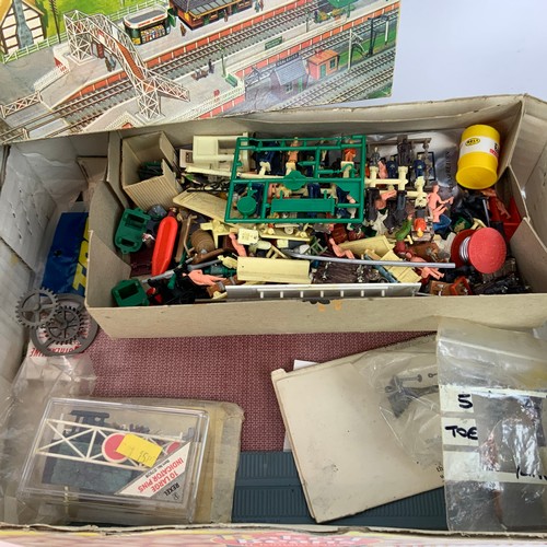 258 - An assortment of railway accessories, to include lead figures, signals, luggage, railway men and oth... 