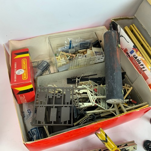 258 - An assortment of railway accessories, to include lead figures, signals, luggage, railway men and oth... 