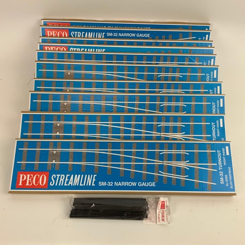 259 - Ten unboxed PECO Streamline SM-32 narrow gauge right hand track.