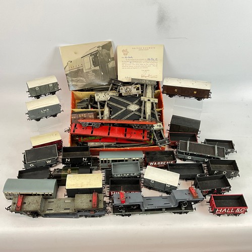 264 - O Gauge track and assorted coaches and wagons, to include WC& PR, GW, CM & D.R, H &L. In... 