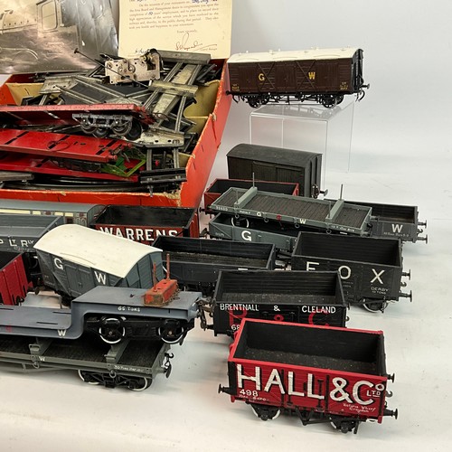 264 - O Gauge track and assorted coaches and wagons, to include WC& PR, GW, CM & D.R, H &L. In... 