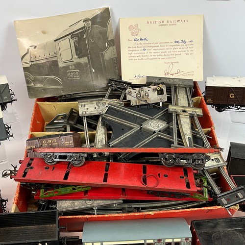 264 - O Gauge track and assorted coaches and wagons, to include WC& PR, GW, CM & D.R, H &L. In... 