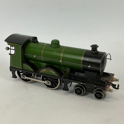 265 - A Duke of York clockwork model train by Bassett-Lowke of London and Northampton, accompanied by a bo... 