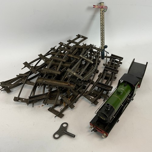 265 - A Duke of York clockwork model train by Bassett-Lowke of London and Northampton, accompanied by a bo... 