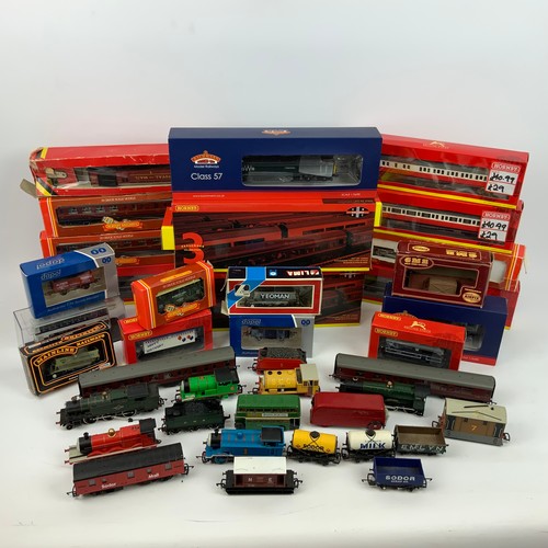 281 - A large collection of model trains, including locomotives and rolling stock from makers Hornby, Bach... 