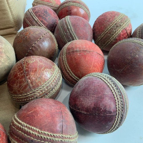 284 - A large collection of 35 vintage play-worn cricket balls, with examples by Readers, Ram cricket and ... 