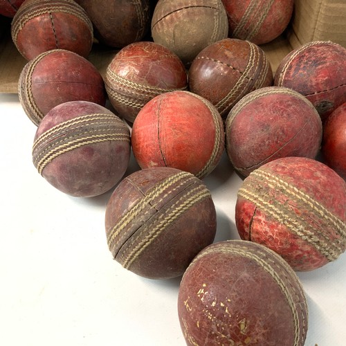 284 - A large collection of 35 vintage play-worn cricket balls, with examples by Readers, Ram cricket and ... 
