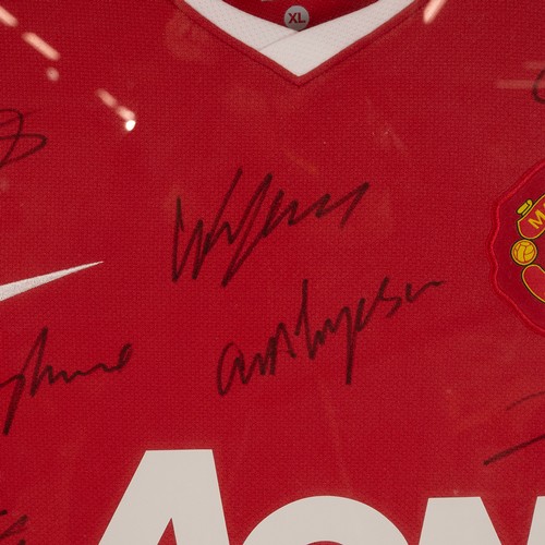 285 - A 2010 Signed Manchester United football shirt framed and glazed, with a certificate of authenticity... 