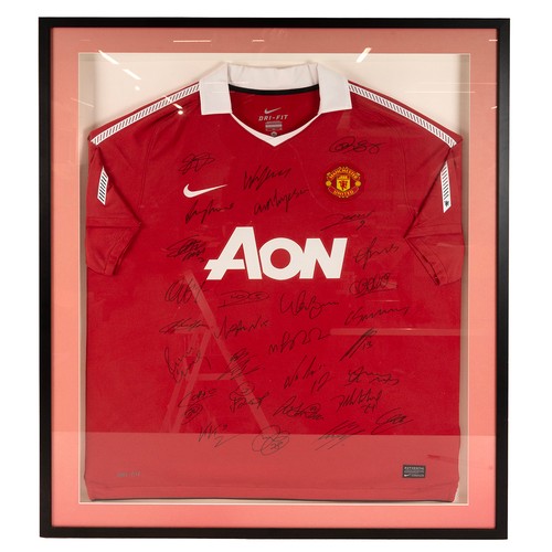 285 - A 2010 Signed Manchester United football shirt framed and glazed, with a certificate of authenticity... 