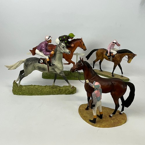 287 - A collection of four resin D. Geenty jockey and horse figures from the Hamilton Collection, to inclu... 
