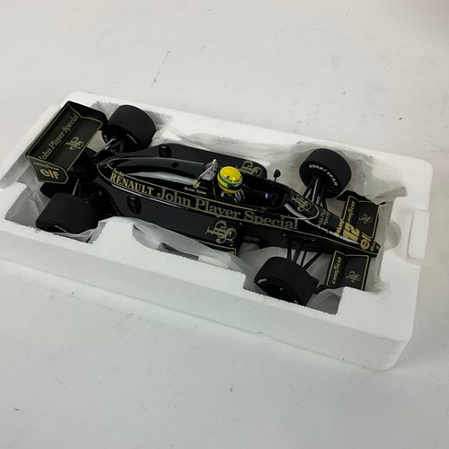 289 - Two Grand Prix legends, die-cast 1/18 scale F1 model cars, Ayrton Senna's Lotus and Williams.