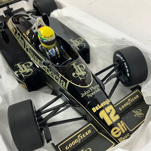 289 - Two Grand Prix legends, die-cast 1/18 scale F1 model cars, Ayrton Senna's Lotus and Williams.