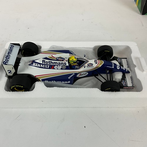 289 - Two Grand Prix legends, die-cast 1/18 scale F1 model cars, Ayrton Senna's Lotus and Williams.