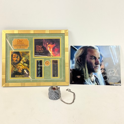 291 - Three Lord of the Rings memorabilia items, to include: a double film cell presentation in frame, a s... 