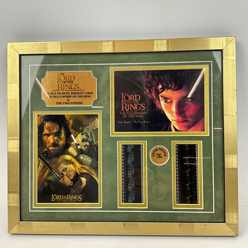 291 - Three Lord of the Rings memorabilia items, to include: a double film cell presentation in frame, a s... 