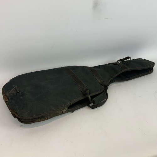 297 - A Fender Squire Stat electric guitar, along with a Fender Sidekick amp.