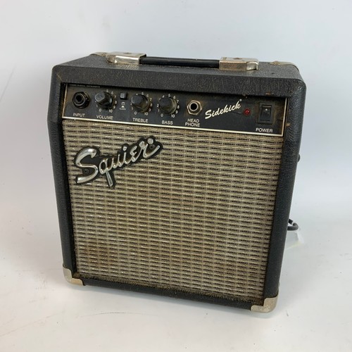 297 - A Fender Squire Stat electric guitar, along with a Fender Sidekick amp.