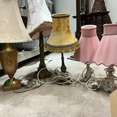 24 - A pair of ceramic lamps and three other lamps, all with shades.Untested for electrical safety. Sold ... 