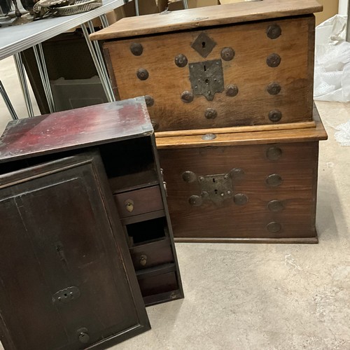 44 - Two wooden trunks along with an oriental cupboard.