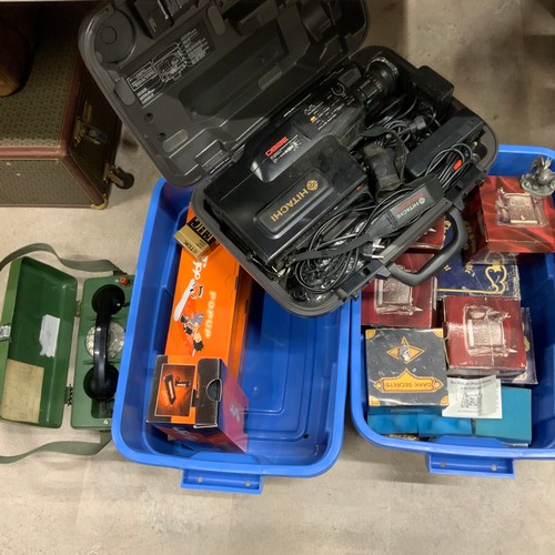 52 - Eight boxes of Tudor Mint figures, a Hitachi camcorder, an army telephone and other items.